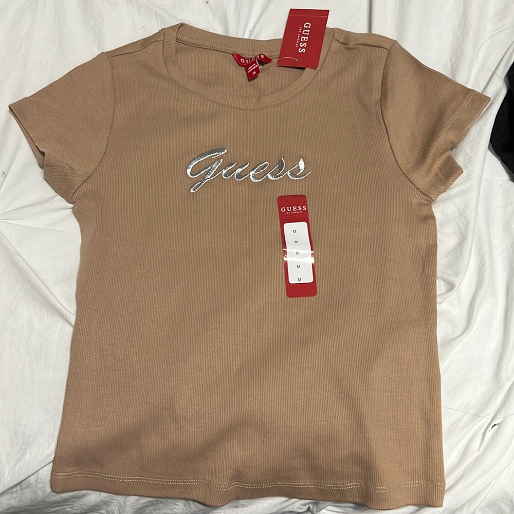 Guess logo top